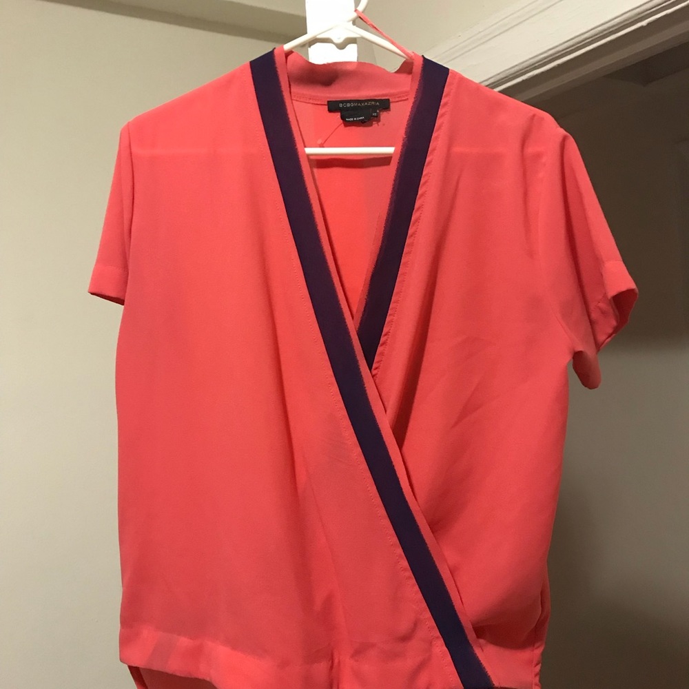 BCBG blouse. Its but really fits s/m better.